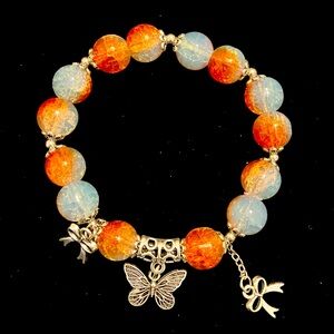 Orange and blue beaded bracelet with a butterfly charm #fairycore 
18cm/7.09in